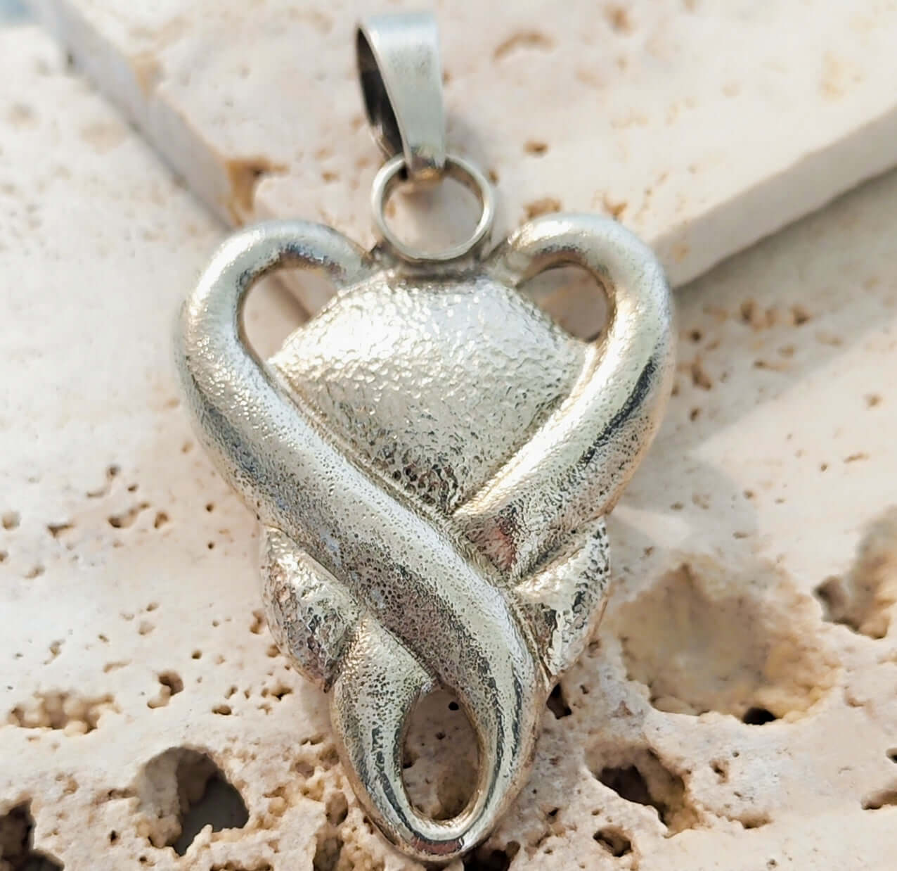 Pendentif Amplexus