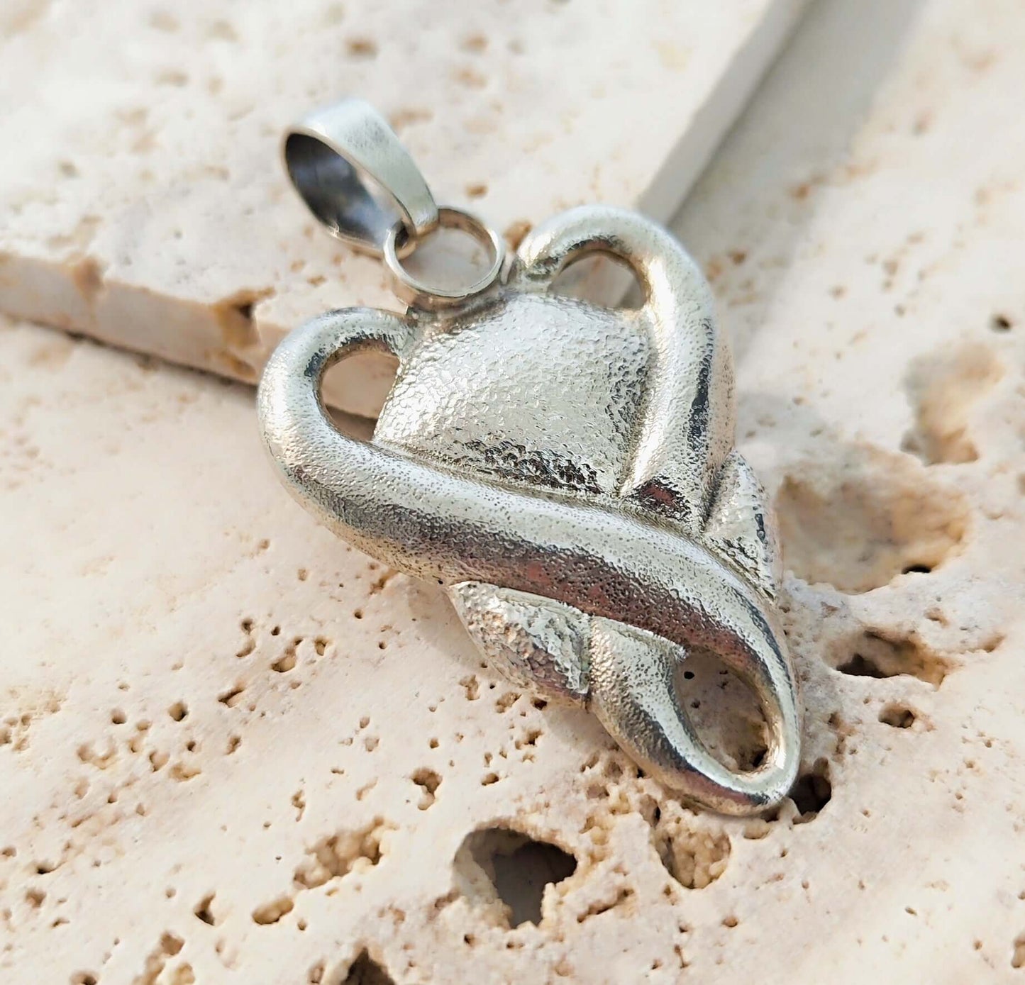 Pendentif Amplexus