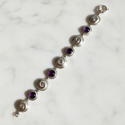 Bracciale Chiocciole Viola — laterale marmo bianco